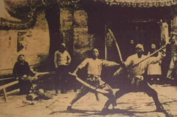 A martial arts performance at a marketplace in Shanghai, circa 1930. Source Huan Fei Hung Museum.A martial arts performance at a marketplace in Shanghai, circa 1930. Source Huan Fei Hung Museum.